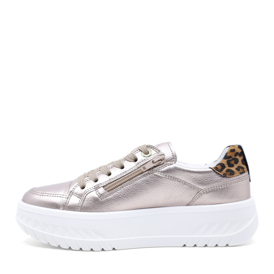 Silver metallic sneaker with leopard print accents on a white background