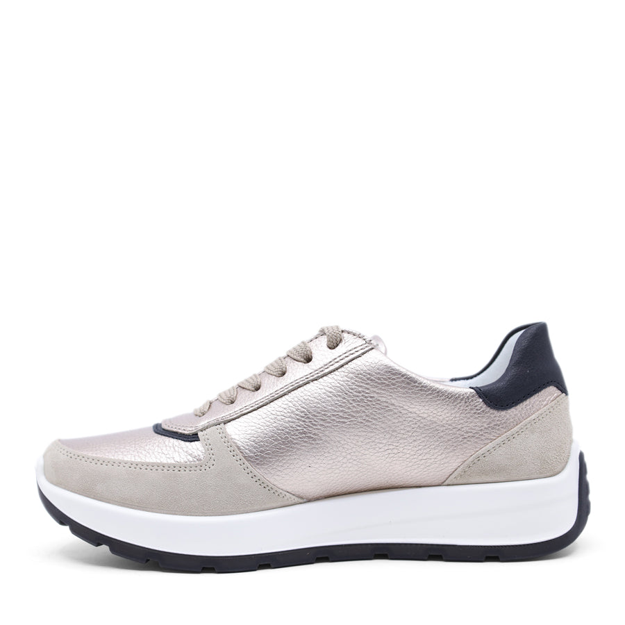 Grey metallic sneaker with black accents on a white background