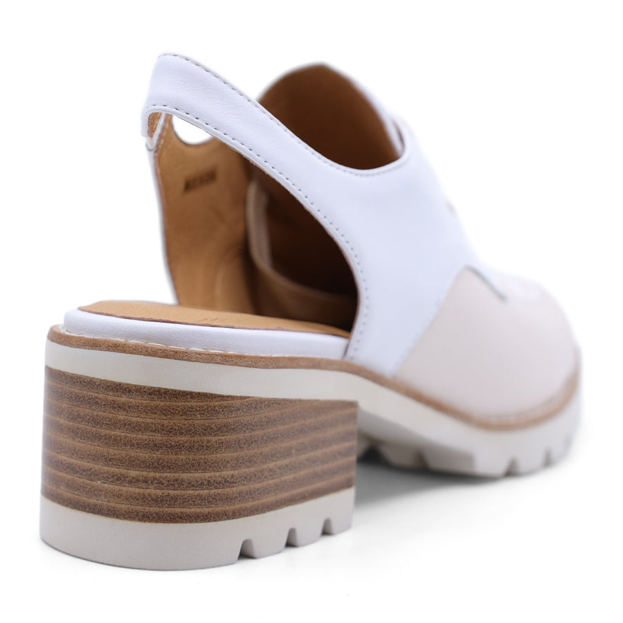 White and beige shoe with a block heel sandal