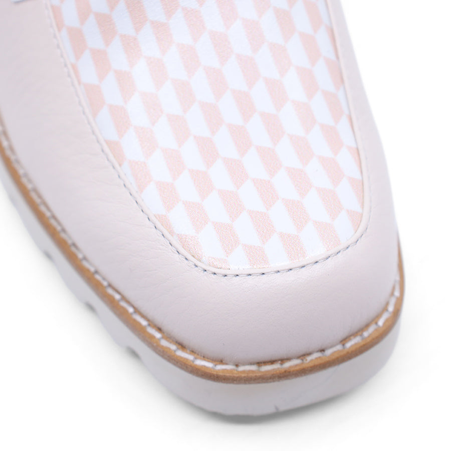 White and beige shoe with a block heel sandal