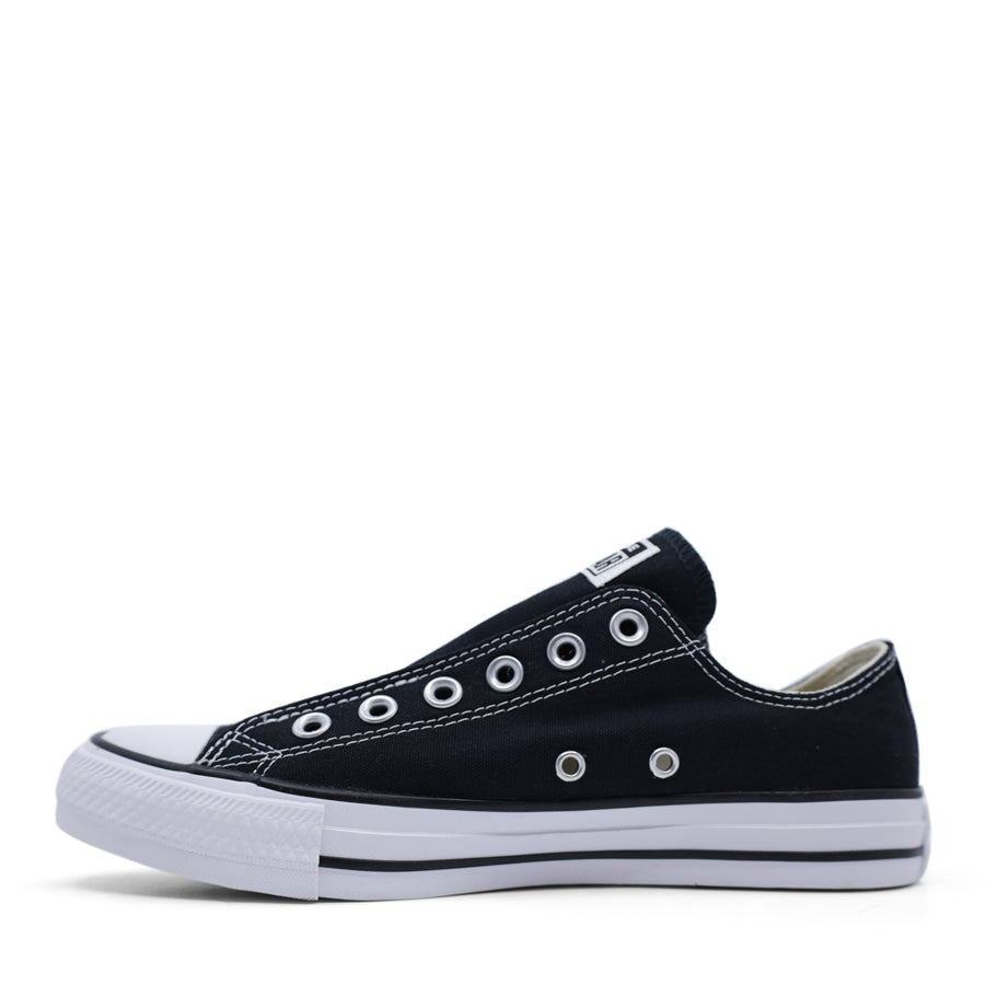 Black low cut Converse slip on sneaker side view