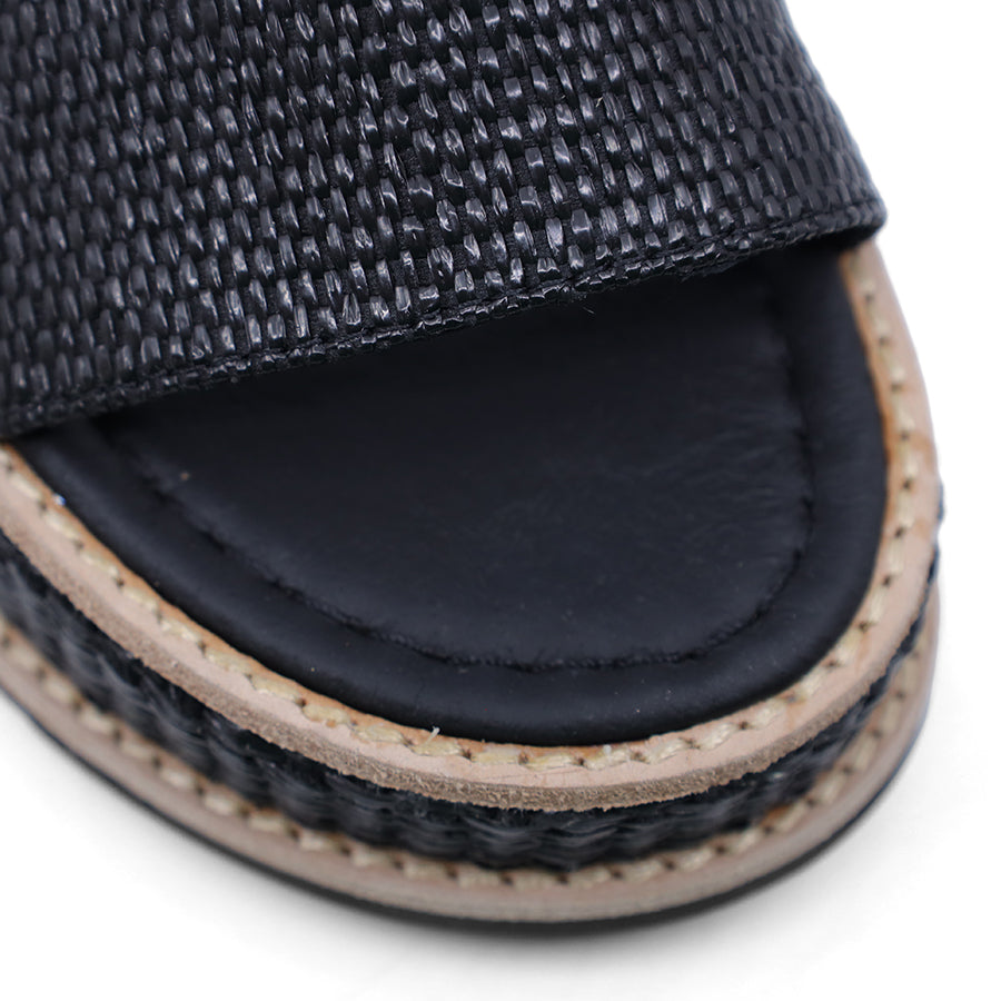 Black sandal with woven sole 