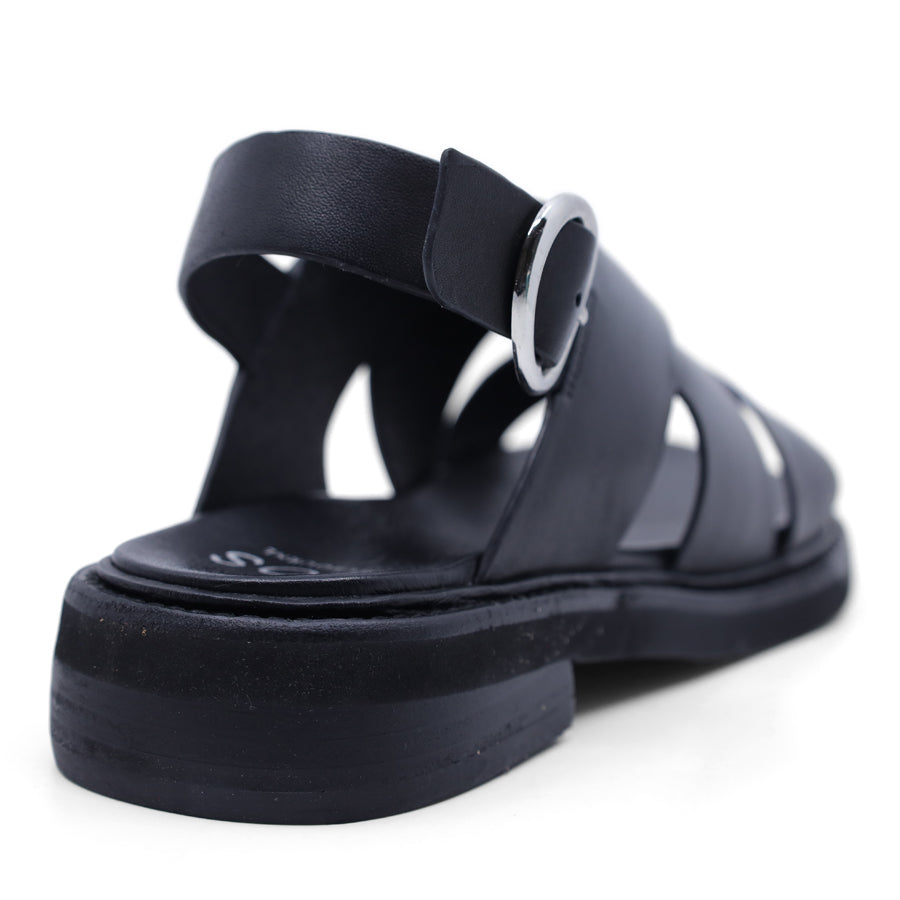 Black sandal with criss-cross straps and sling back buckle closure