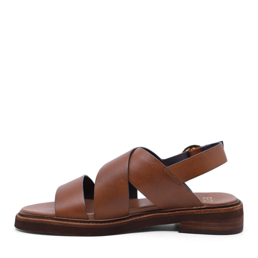 Brandy brown sandal with criss-cross straps and sling back buckle closure