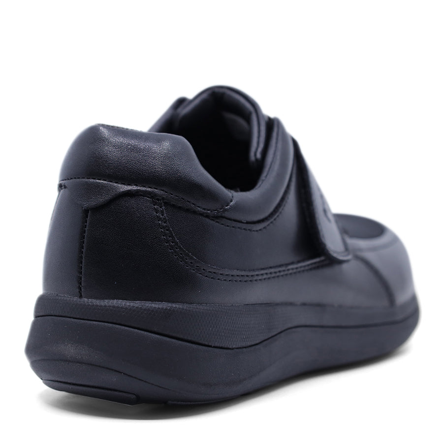 black shoe with a velcro strap