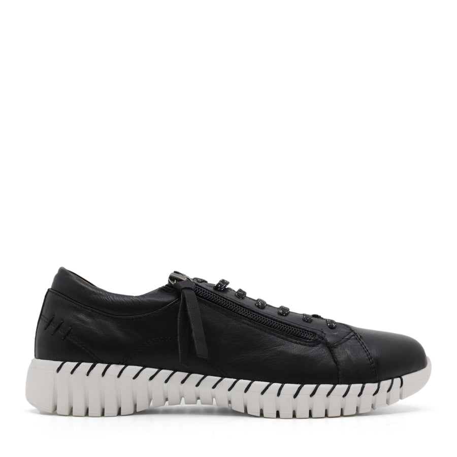 side view of black lace up sneaker with side zip and white sole