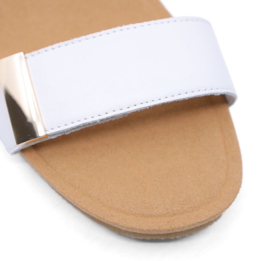 White wedge sandal with a wooden wedge sole and velcro strap